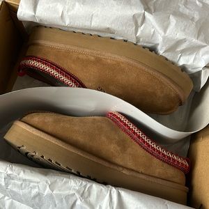 Never worn before! Ugg Tazz Slippers. Kids Size 4, fits a women’s size 6!!